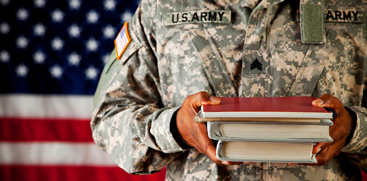 veteran holding books military image for financial aid