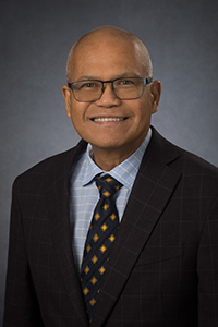 Michael Rayel, MD headshot Michael Rayel, MD headshot