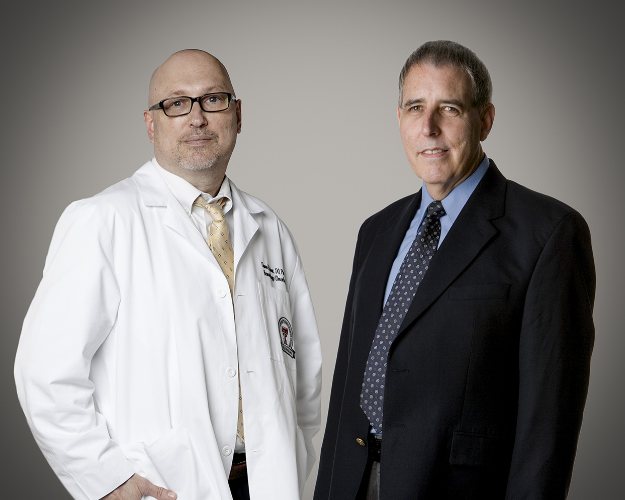 Drs. Hutson and Reynolds facing the camera